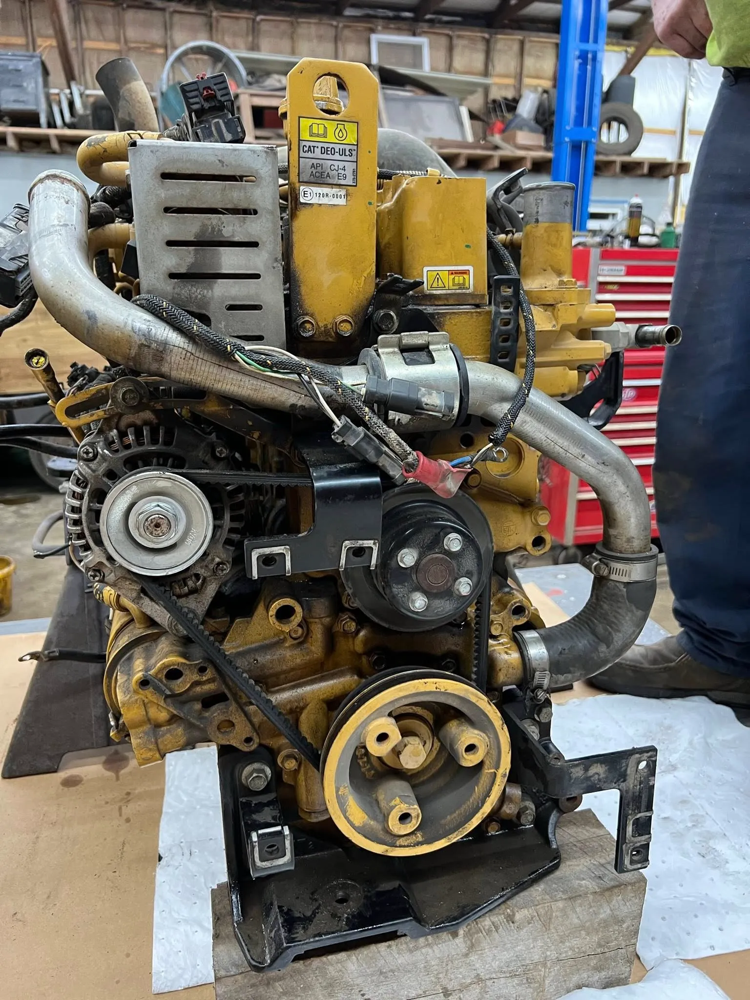 CAT diesel engine pulled and mounted for a full rebuild